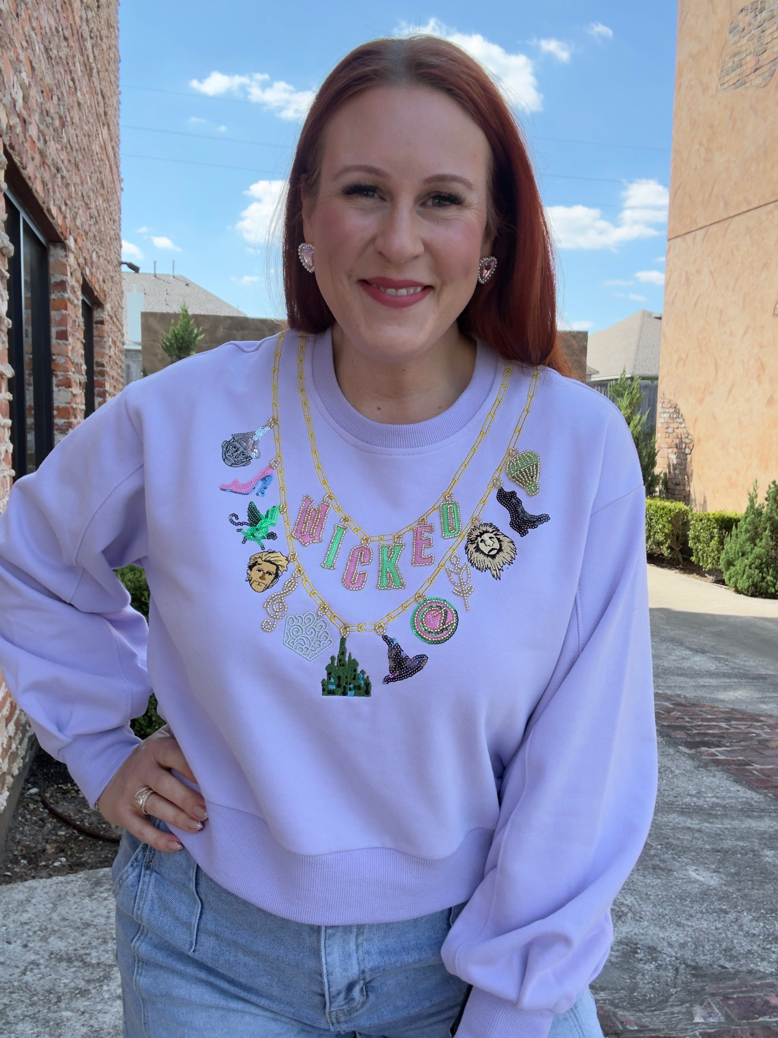 Queen of Sparkles Licensed Lavender Wicked Charm Necklace Sweatshirt