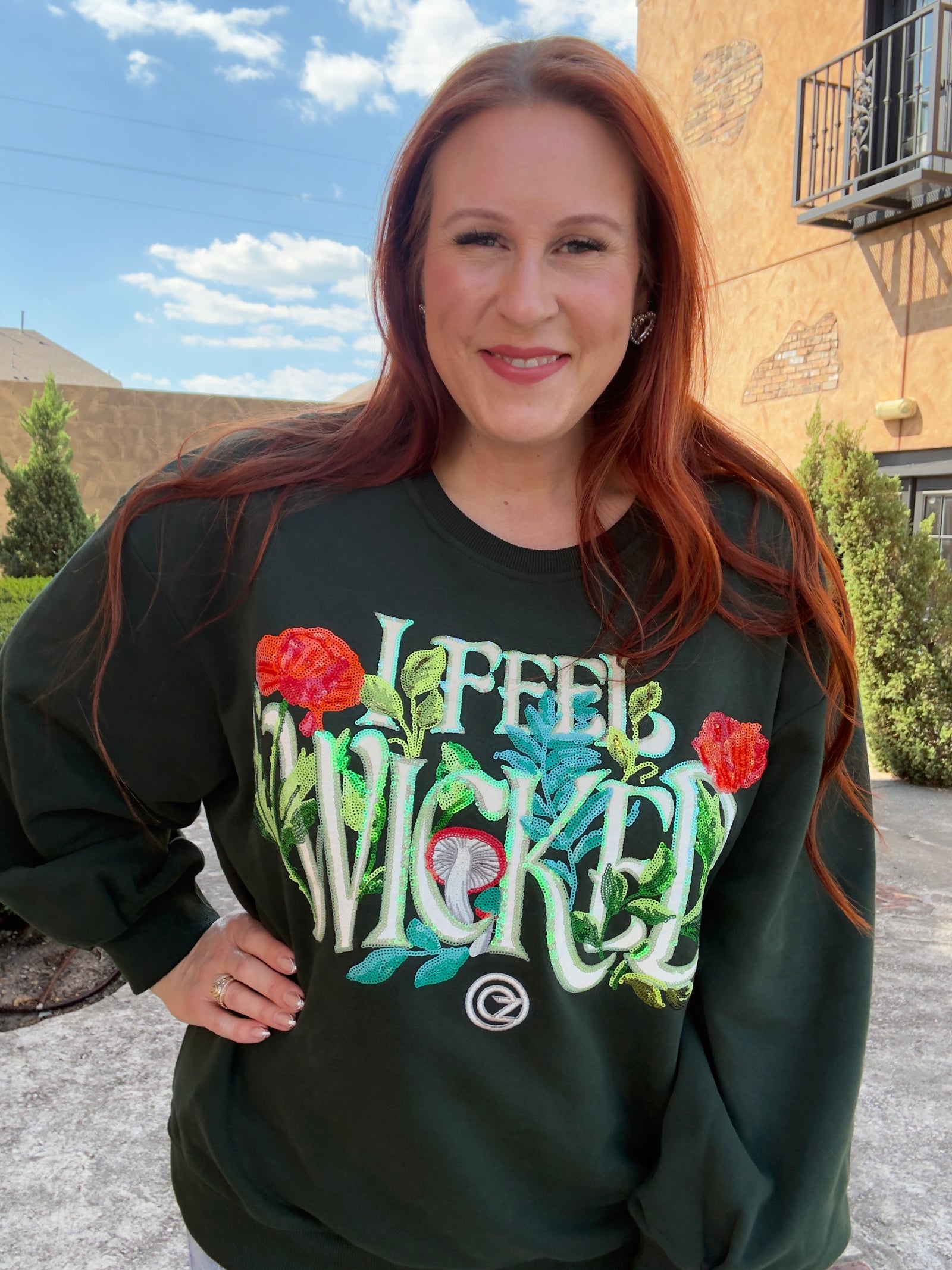 Queen of Sparkles Licensed Forest Green 'I Feel Wicked' Sweatshirt