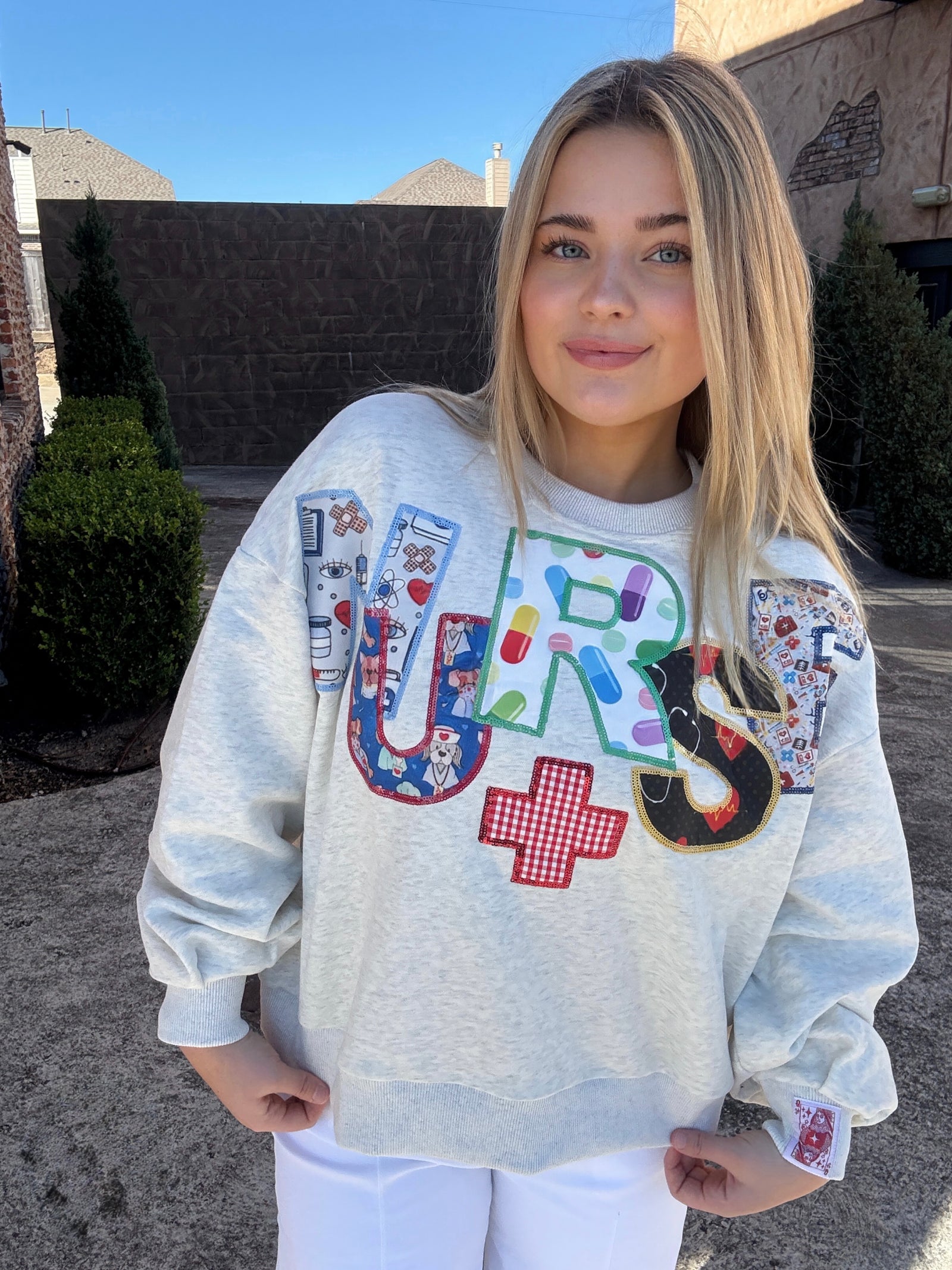 Queen of Sparkles Grey 'Nurse' Multi Fabric Sweatshirt