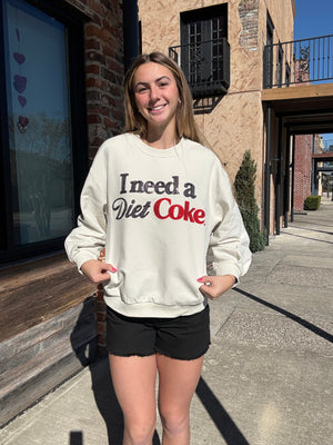 Queen of Sparkles Licensed Beige 'I Need A Diet Coke' Sweatshirt