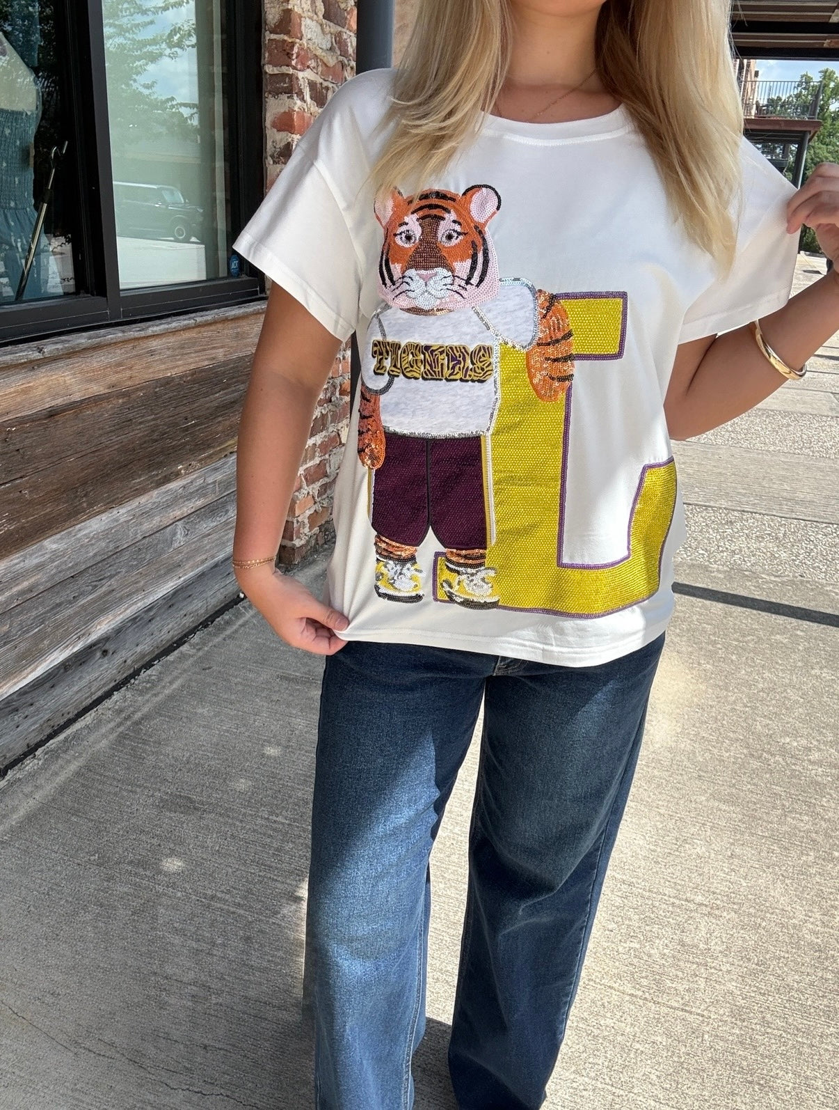 Queen of Sparkles Licensed LSU Mascot Leaning on Letter Tee