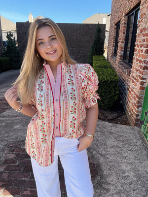 The Rosette Ruffle Top