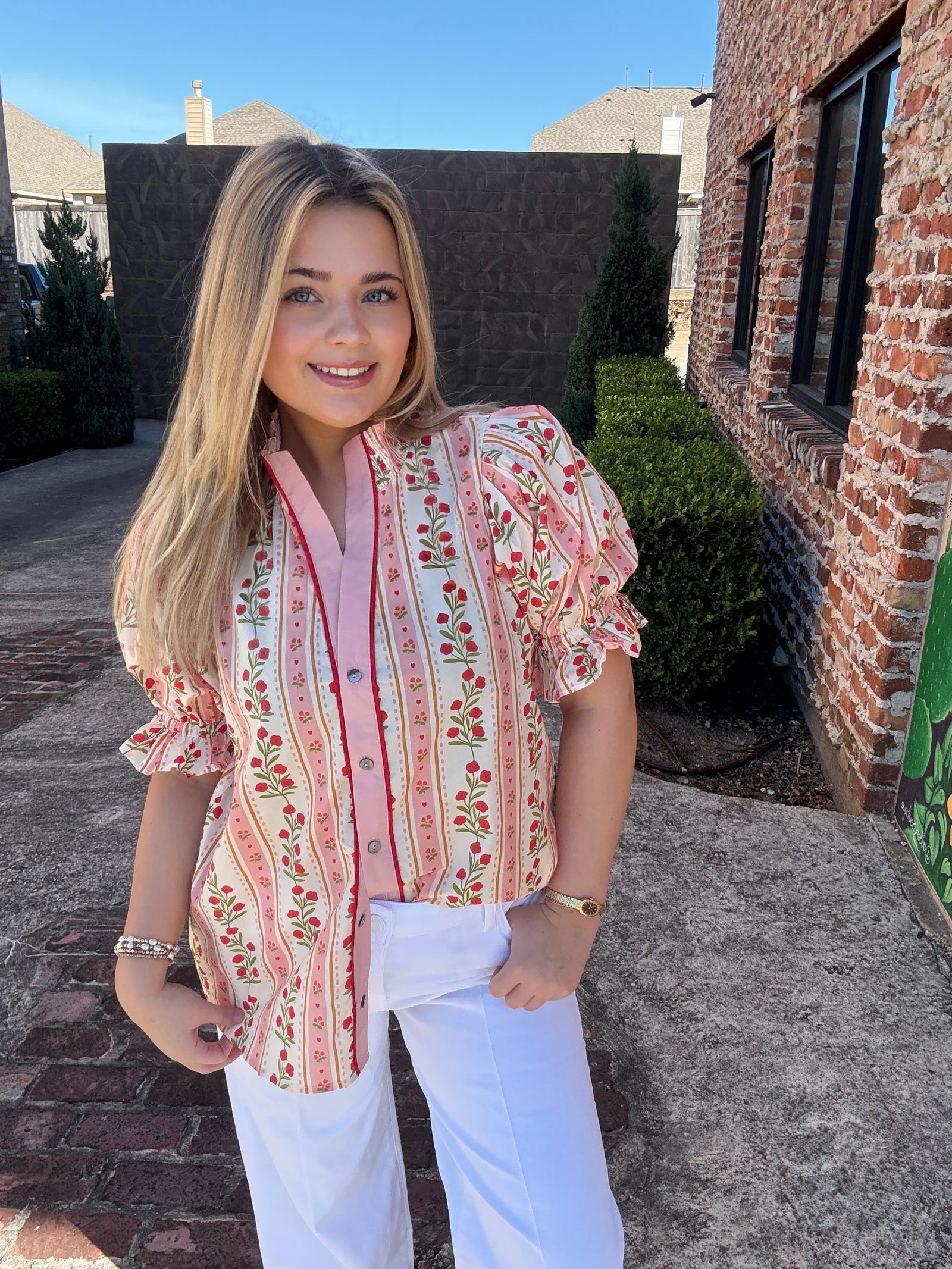 The Rosette Ruffle Top