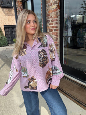 Lavender gingham button‑up top with sequin cat designs, long sleeves, shown on a female model.