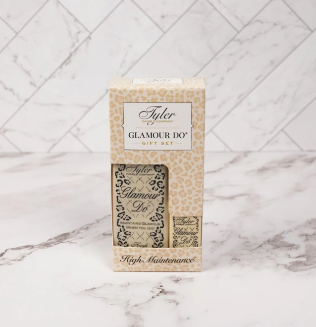 Tyler Glamour Do gift set packaging on a marble background
